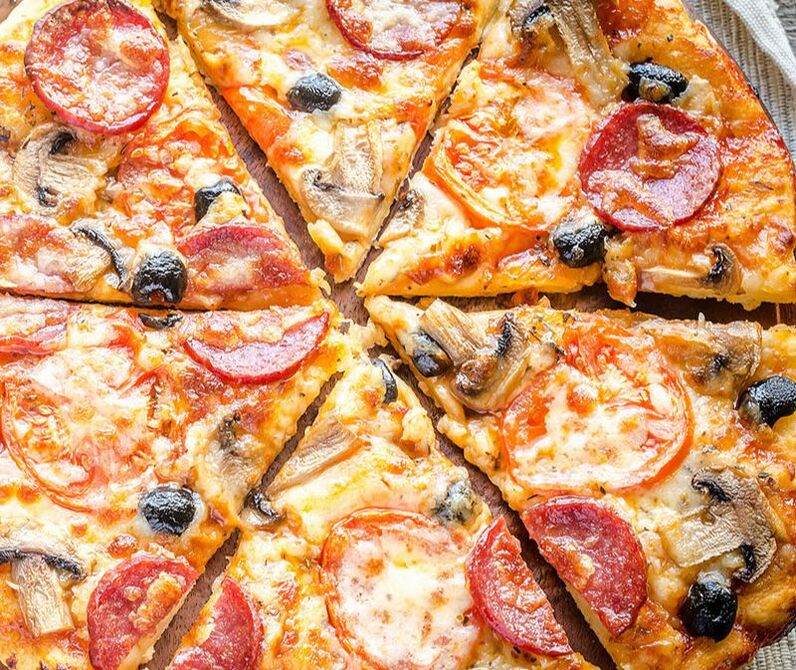Pizza with pepperoni and mushrooms